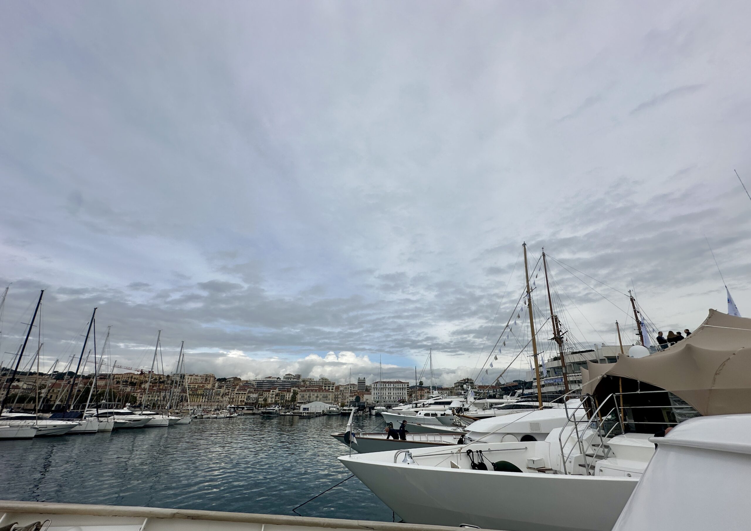 Luxury yacht charter ILTM Cannes 2026 travel exhibitors premium boat moored Port Canto Palais des Festivals view