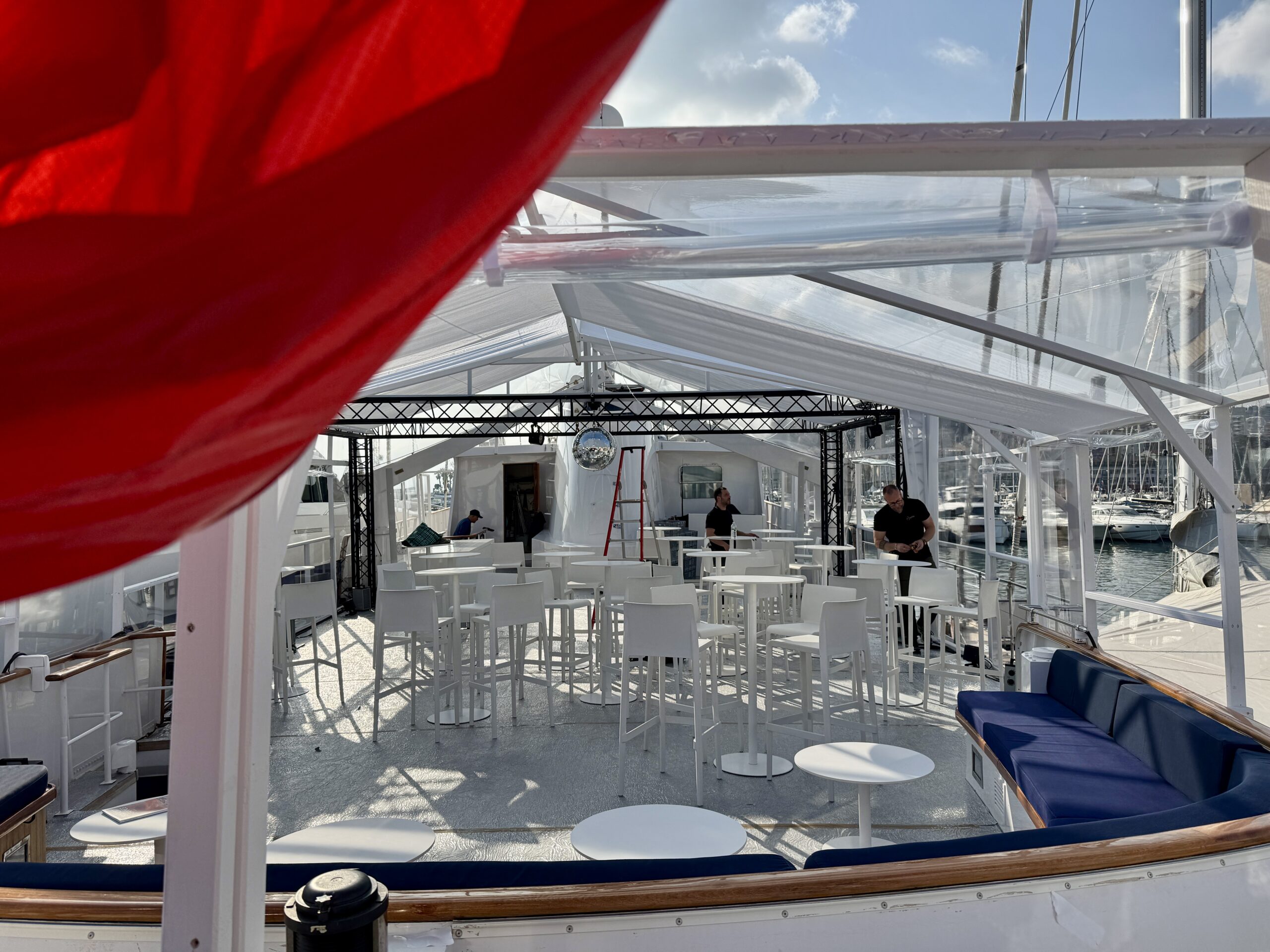 yacht corporate Cannes Lions 2027 - corporate networking reception under a crystal awning on a fitted yacht at the Palais des Festivals harbour during a Cannes congress
