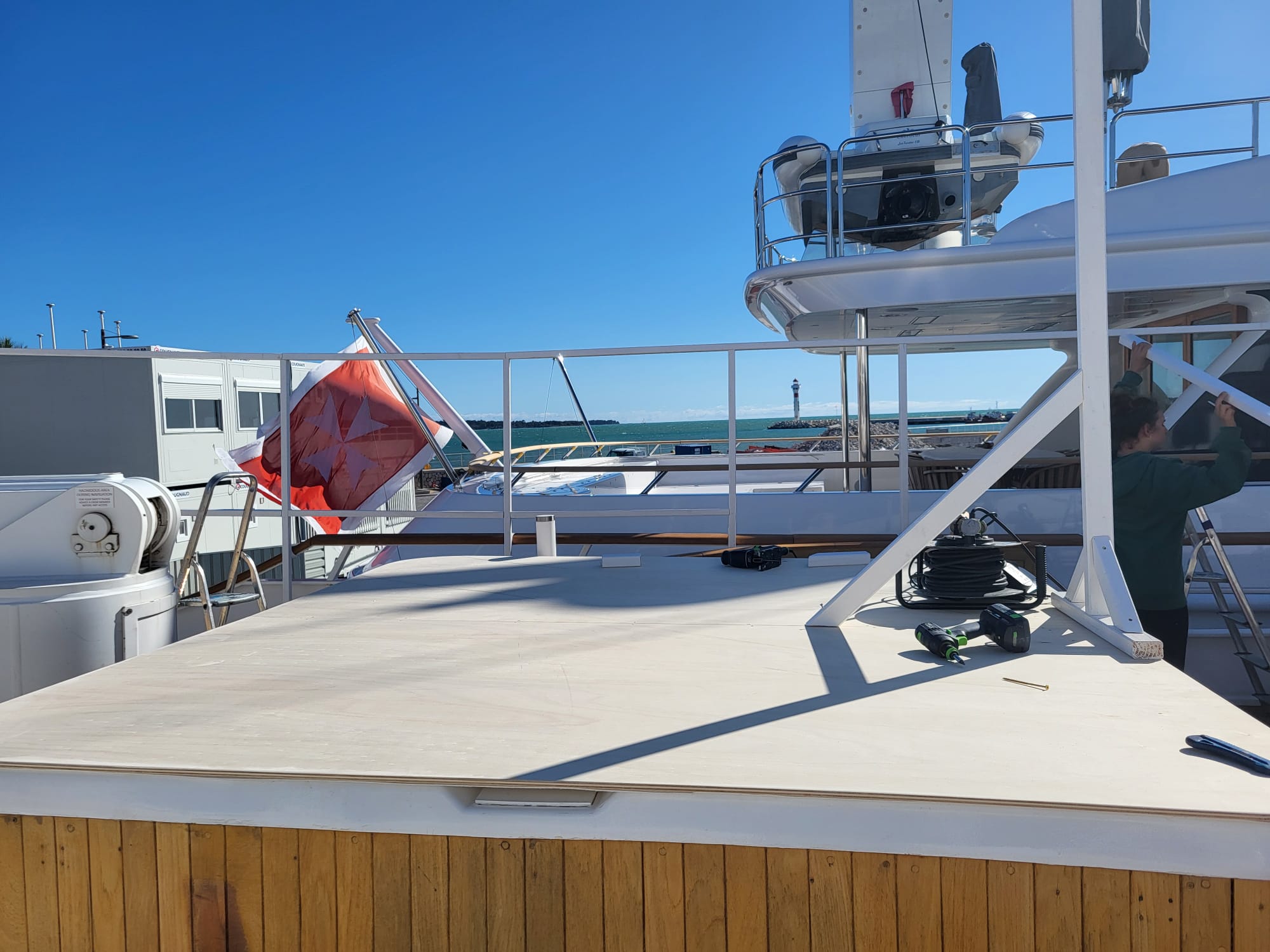 Cannes Lions Official Yacht Partner Package - deck of a corporate yacht moored at the Palais des Festivals harbour, illustrating the new official yacht mooring framework during the festival
