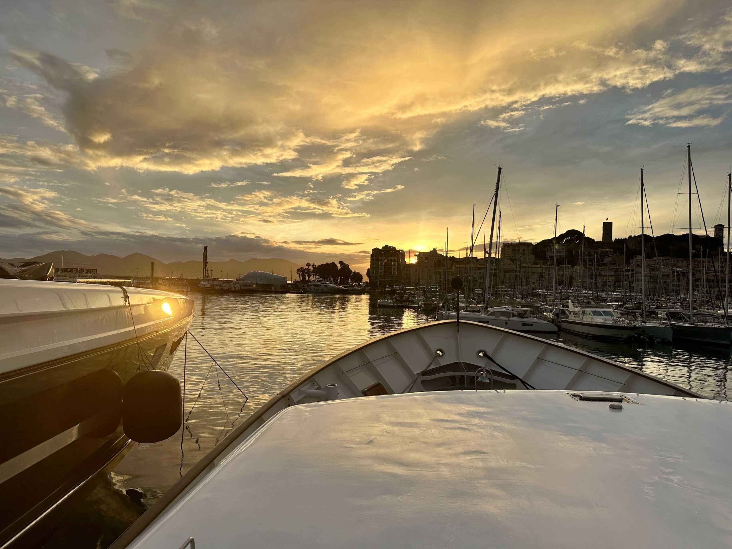 Yacht charter Cannes trade show — yacht berthed at the Palais des Festivals port for a corporate reception